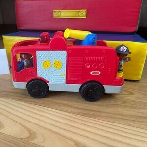 Fisher-Price Red and Yellow Fire Engine Little People toy, with two figures
